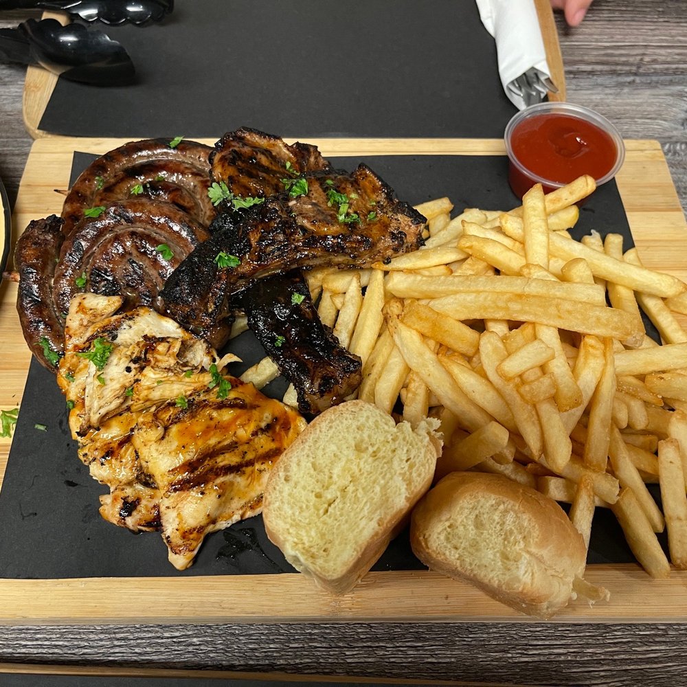Salad, mixed Braai platter with lamb chop, chicken and boerewors. Salad, mixed Braai platter with lamb chop, chicken and boerewors.