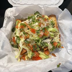 Carnitas rolled tacos