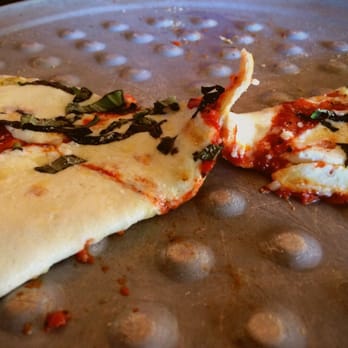 Naples Flatbread Kitchen & Bar - Classico slices are high 5'ing each other. (-_-) - Pizza Near Me - Estero, Florida