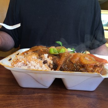 D & G Jamaican Restaurant - a man eating a meal - Caribbean Near Me - Miramar, Florida D & G Jamaican Restaurant - a man eating a meal - Caribbean Near Me - Miramar, Florida