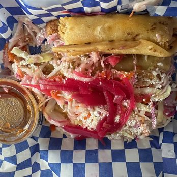 Acao Cafe - Sorry, I already took a bite out of the Honduran Tacos before I photographed them. - Breakfast & Brunch Near Me - Mandeville, Louisiana