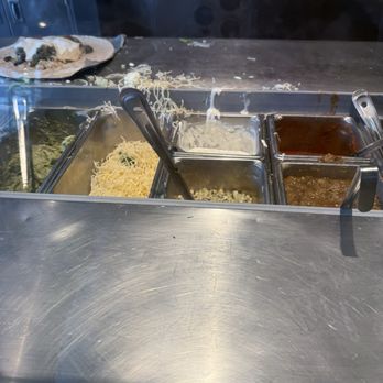 Chipotle Mexican Grill - This is where the food is being served from. And where the chunk of stale corn I bit into came from. - Mexican Near Me - Ann Arbor, Michigan