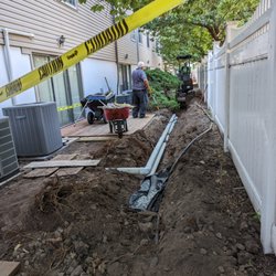 Dario DeFranco Contracting - Your homes downspouts can make for a soggy or eroding yard. By piping away from your house you can improve the quality and enjoyment of your