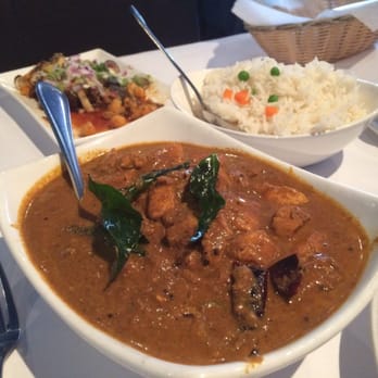 Karavalli - This was spicy and delicious an chicken curry dish with a ting of coconut and deep fried basil. Out of this world! - Indian Near Me - Latham, New York Karavalli - This was spicy and delicious an chicken curry dish with a ting of coconut and deep fried basil. Out of this world! - Indian Near Me - Latham, New York