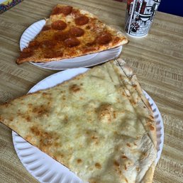 A slice of white pizza and pepperoni
