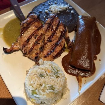 Gloria's Latin Cuisine - Some kind of chicken dish with an enchilada - Latin American Near Me - Plano, Texas Gloria's Latin Cuisine - Some kind of chicken dish with an enchilada - Latin American Near Me - Plano, Texas