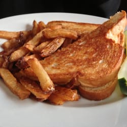 Kid's gourmet grilled cheese with smoked Gouda and bacon.