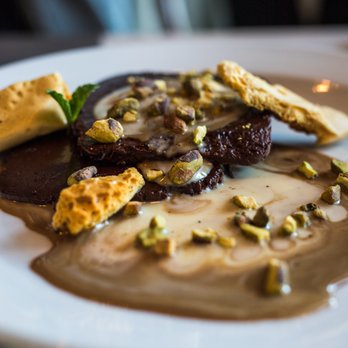 Cassis Bistro - a close up of a plate of food - French Near Me - Calgary, Alberta