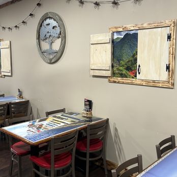 Casa Campo Restaurant - a view of the mountains through the window - Puerto Rican Near Me - Rochester, New York
