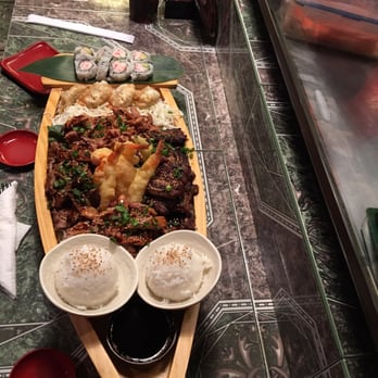 Hamachi Sushi - One of the three boat options. - Sushi Bars Near Me - El Paso, Texas
