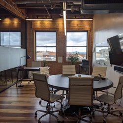 Family Business Center - Executive office with conference table.