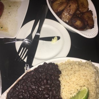 Prime One Twelve - Accessories-Rum Baked Fried Plantains & Rice & Beans - Steakhouses Near Me - Miami Beach, Florida Prime One Twelve - Accessories-Rum Baked Fried Plantains & Rice & Beans - Steakhouses Near Me - Miami Beach, Florida
