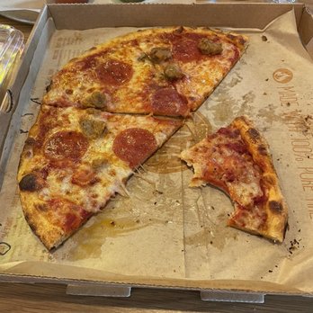 Blaze Pizza - Traditional crust, with pepperoni and sausage. I also had some extra cheese! - Pizza Near Me - Lutz, Florida