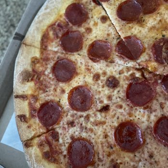 Divano's Pizzeria - a pepperoni pizza - Pizza Near Me - Garner, North Carolina