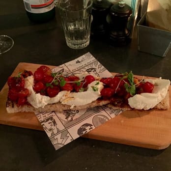 Jamie's Italian - Heritage tomato bruschetta, grilled sourdough, slow-cooked ripe tomatoes, fresh buffalo ricotta and basil - Italian Near Me - Brisbane, QLD