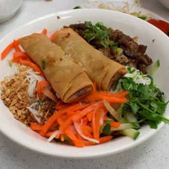 Thai Lemongrass - a plate of food on a table - Thai Near Me - Victoria, British Columbia Thai Lemongrass - a plate of food on a table - Thai Near Me - Victoria, British Columbia