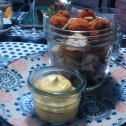 Gustolia - Breaded chicken, with chicory and almonds.