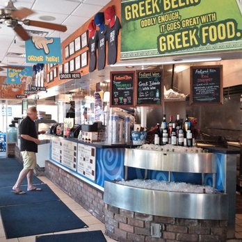 Niko Niko's - This is the long counter at which you order and pick up your food. I'll pass on the Greek beer. - Greek Near Me - Houston, Texas Niko Niko's - This is the long counter at which you order and pick up your food. I'll pass on the Greek beer. - Greek Near Me - Houston, Texas