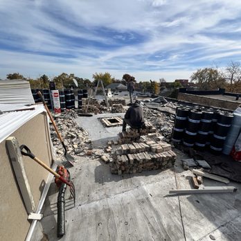 Perez Roofing & Masonry - Tear-off roof replacement in progress - Roofing Near Me