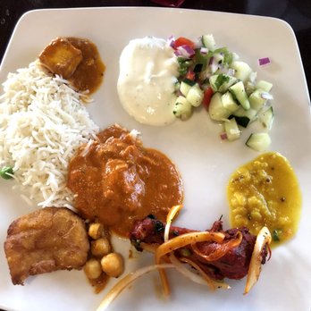 Bollywood Bistro - Lunch buffet plate - samosa, rice, paneer curry, chicken tikka masala, chicken tandoor, cucumber salad, and yogurt sauce - Indian Near Me - Fairfax, Virginia Bollywood Bistro - Lunch buffet plate - samosa, rice, paneer curry, chicken tikka masala, chicken tandoor, cucumber salad, and yogurt sauce - Indian Near Me - Fairfax, Virginia
