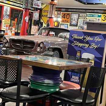 Pit Stop Diner - Table legs made of tire rims. - Diners Near Me - Oceanside, California