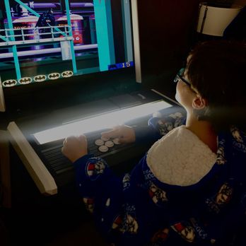 Element Melbourne Richmond - Arcade room. Son gets high score on Atari Batman - Hotels Near Me - Burnley, VIC