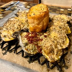 Cafe Josephine - Trio oysters : creamy lump crab meat Creamed spinach and house-made bacon Seafood etouffee sauce