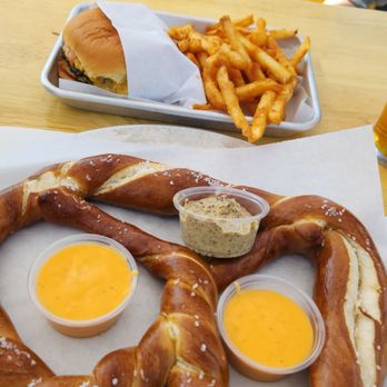 Green Cheek Beer Co. - Burger and pretzel.  Delicious! - Breweries Near Me - Sunset Beach, California