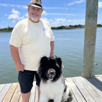 SmacNally's - On the deck connected to the restaurant. Tony & Bearett - Seafood Near Me - Ocracoke, North Carolina