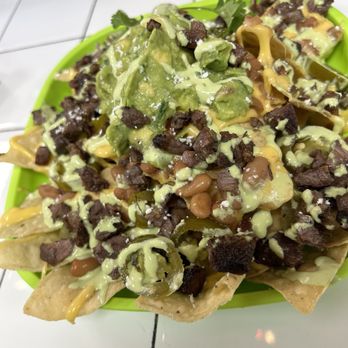 Sonoratown - Bar nachos with grilled asada and jalapeño  Goes good with an Incline IPA - Mexican Near Me - Los Angeles, California