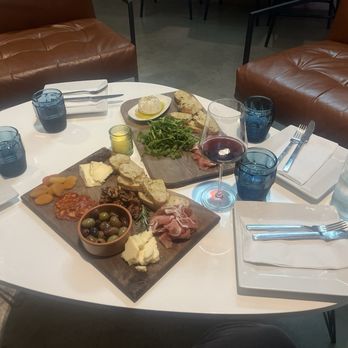 West Tasting Room - Charcuterie board in the front, burrata board in the back - Wine Bars Near Me - Thousand Oaks, California West Tasting Room - Charcuterie board in the front, burrata board in the back - Wine Bars Near Me - Thousand Oaks, California