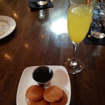 Jack Allen's Kitchen - Mini pancakes with syrup and a mimosa. Sunday Brunch Buffet. - Southern Near Me - Round Rock, Texas Jack Allen's Kitchen - Mini pancakes with syrup and a mimosa. Sunday Brunch Buffet. - Southern Near Me - Round Rock, Texas