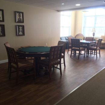 Concordia Village - Card tables are scattered around the facility for people to meet up to play cards, games, puzzles, or just talk - Retirement Homes Near Me - Springfield, Illinois