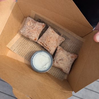 Beignets & Brew - 3 specialty cinnamon and sugar Biegnets with cinnamon roll icing - Coffee & Tea Near Me - Destin, Florida Beignets & Brew - 3 specialty cinnamon and sugar Biegnets with cinnamon roll icing - Coffee & Tea Near Me - Destin, Florida