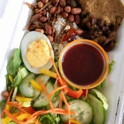 Kampong - Taste Of Malaysia - Nasi lemak has a tasty sauce on the chicken and an aromatic coconut rice