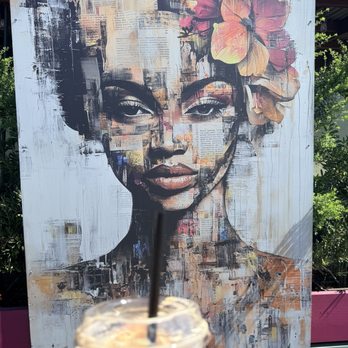 Slow Rush - A pic of my coffee with some beautiful art work right next to the coffee shop - Coffee & Tea Near Me - Paso Robles, California