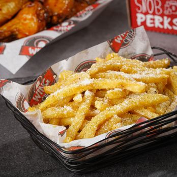 Wing Snob - a basket of french fries and a box of chicken wings - Chicken Wings Near Me - Fenton, Michigan Wing Snob - a basket of french fries and a box of chicken wings - Chicken Wings Near Me - Fenton, Michigan