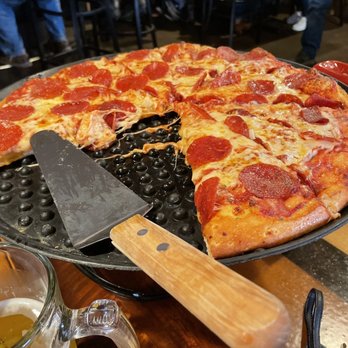 Thompson's Pizzeria - large pepperoni pizza with butter garlic crust - Pizza Near Me - Chelsea, Michigan