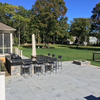 All-Scapes - a patio with a table and chairs - Tree Services Near Me - Exeter, Rhode Island