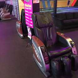 Urban Air Trampoline and Adventure Park - Massage chairs operated by bills and credit card.