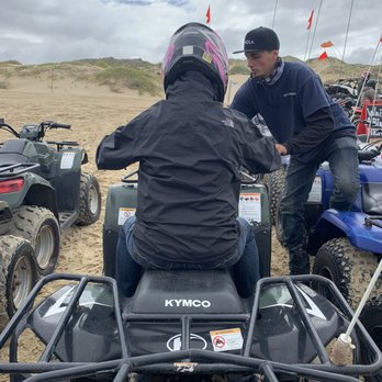 BJ's ATV Rentals - Helping mom out get started. I forgot his name but he was so nice! - Motorcycle Dealers Near Me - Oceano, California BJ's ATV Rentals - Helping mom out get started. I forgot his name but he was so nice! - Motorcycle Dealers Near Me - Oceano, California