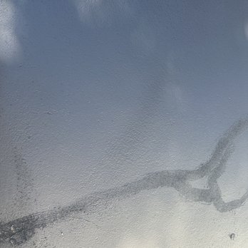 Economy Asphalt & Roofing - That is how they fill the cracks. - Roofing Near Me - Edison, New Jersey