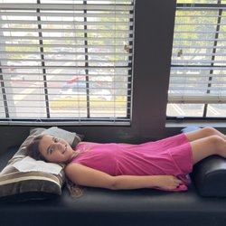 Atlas Chiropractic & Wellness Center - My daughter on the massage table thing after hurting her back on trampoline