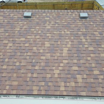 Northern Skies Roofing - Garage done - Roofing Near Me