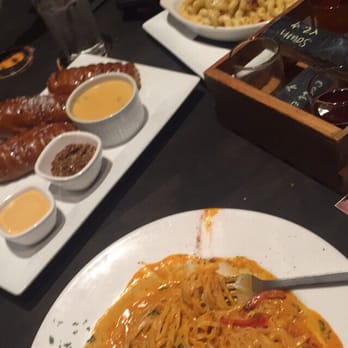 Lock 27 Brewing Restaurant - Pretzels, thia curry, and mad and cheese topped with bacon and bleu cheese. - Breweries Near Me - Centerville, Ohio Lock 27 Brewing Restaurant - Pretzels, thia curry, and mad and cheese topped with bacon and bleu cheese. - Breweries Near Me - Centerville, Ohio