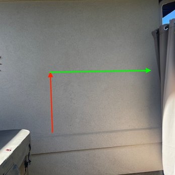 All Current Electric - Inside the hot tub enclosure - drape at right.  Red arrow is outlet on the other side of the wall. 5' to green arrow for location to code. - Electricians Near Me