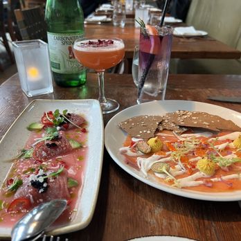 Foreign Cinema - Our appetizers of smoke, salmon, and sashimi. Gross gin drink in back ground - Breakfast & Brunch Near Me - San Francisco, California Foreign Cinema - Our appetizers of smoke, salmon, and sashimi. Gross gin drink in back ground - Breakfast & Brunch Near Me - San Francisco, California