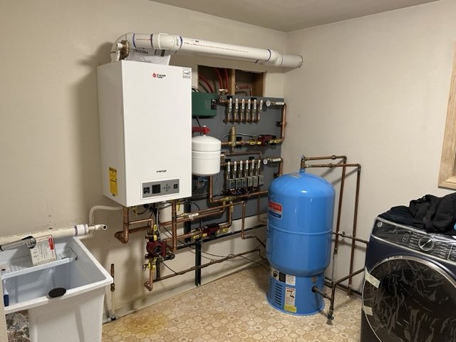 Slide of Carlos' Plumbing and Heating