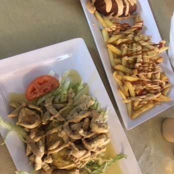 Genesis - Top plate: Chicken Cordon Bleu Bottom Plate: Garlic Chicken Mofongo - Puerto Rican Near Me - San Juan, Puerto Rico