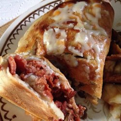 Susans Pizza - Half eaten calzone